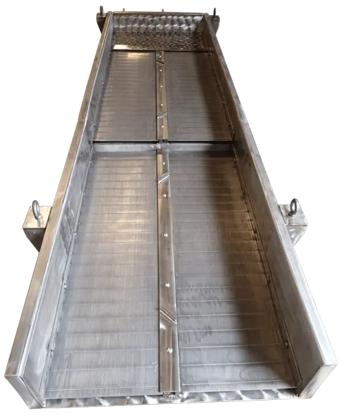 Vibratory screener designed for bulk processing applications with angled deck and enclosed motor housing