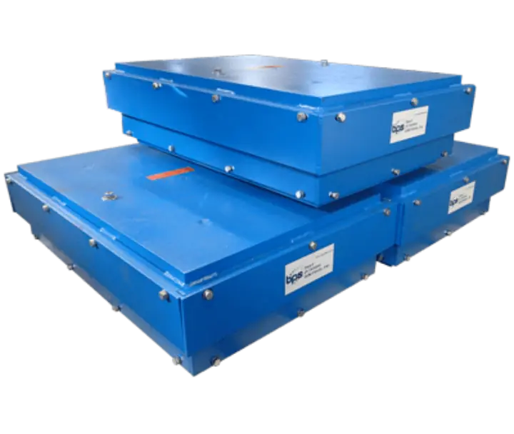 Shredder Isolation System with dual vibratory isolators and center-mounted discharge port for effective vibration damping