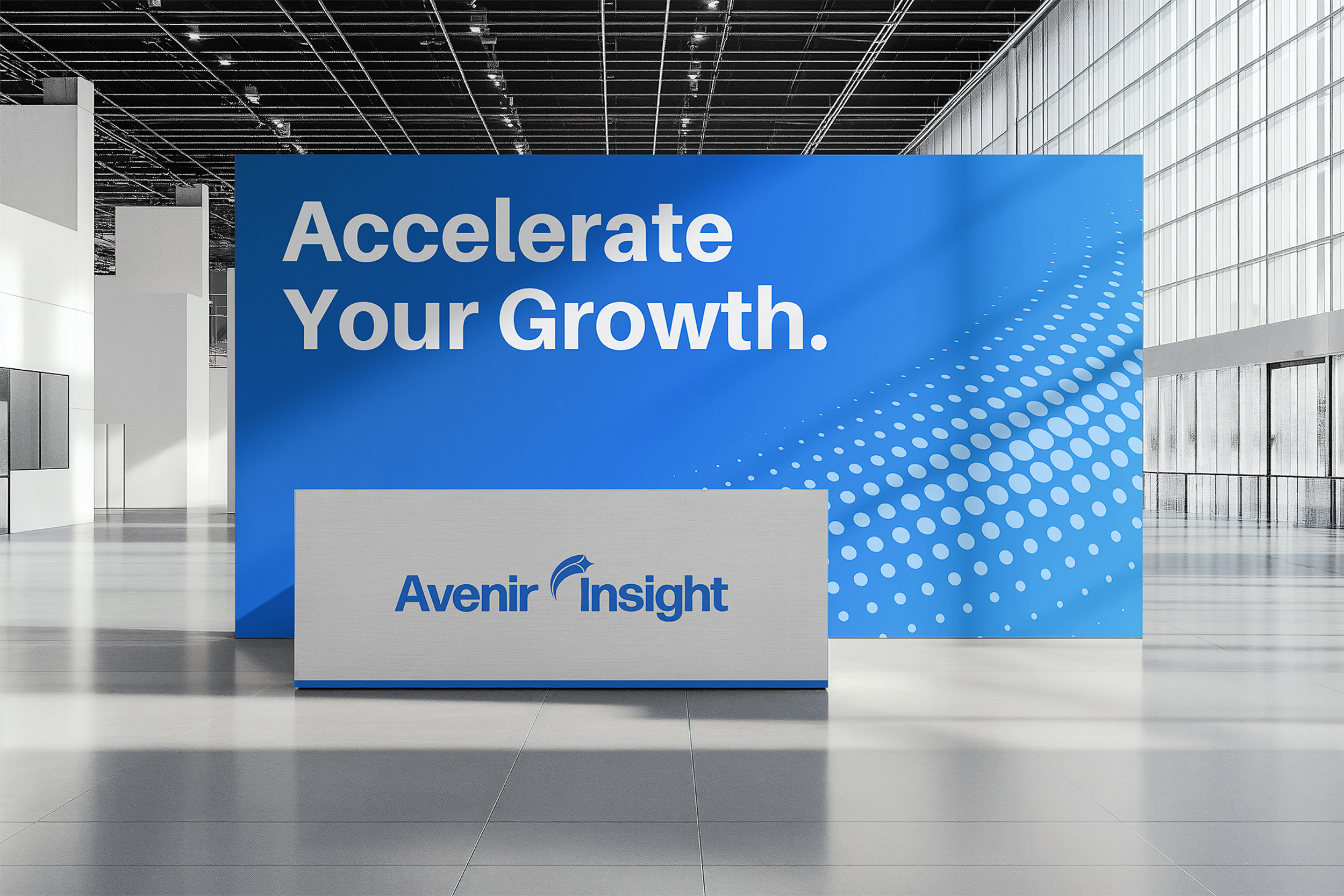 Avenir Insight trade-show booth with blue Accelerate Your Growth backdrop and reception desk