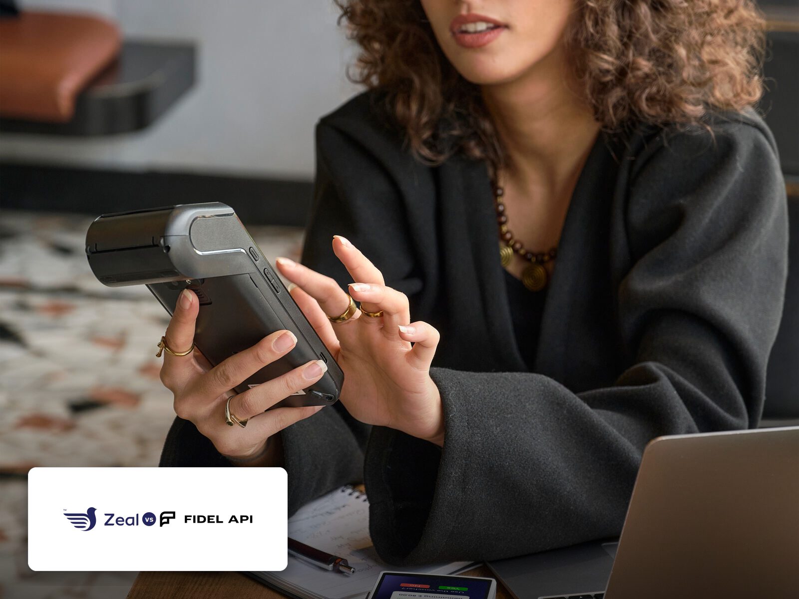 Customer tapping a phone on a Zeal-enabled card machine showing loyalty stamps