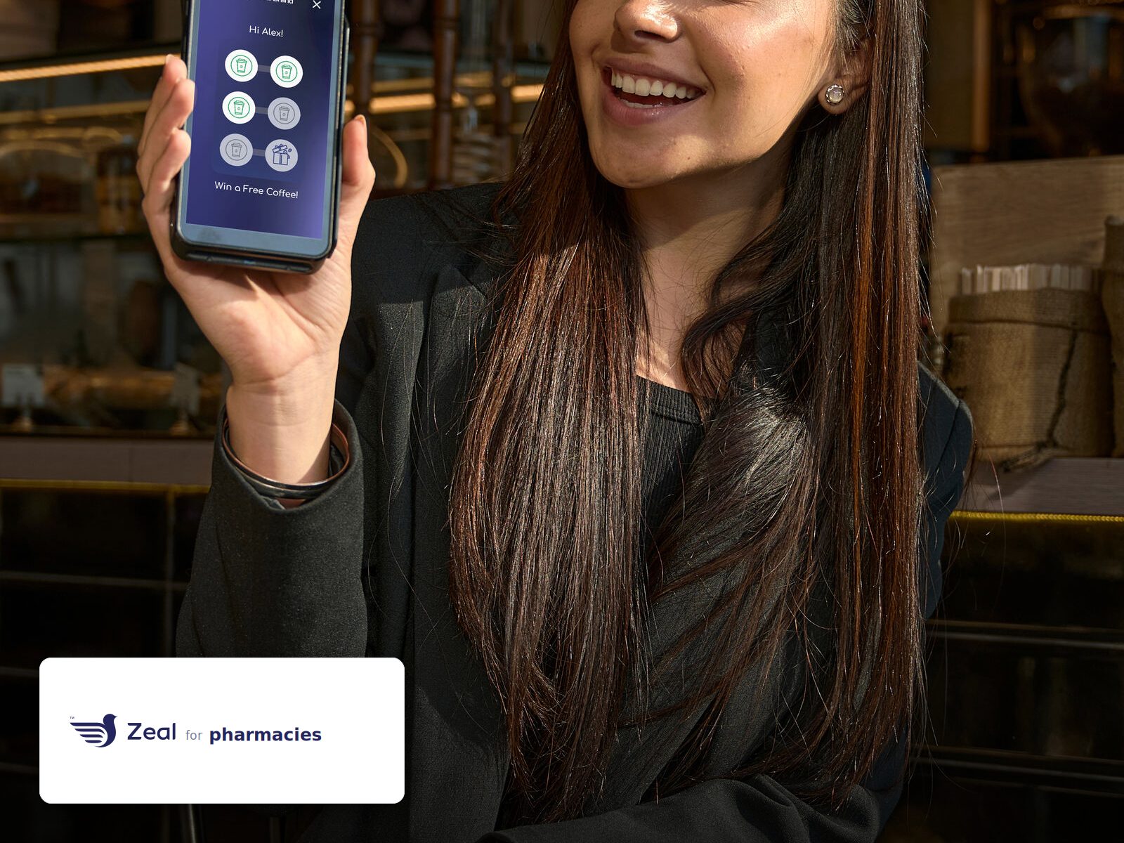 Staff and customer at the counter with a Zeal-enabled card machine