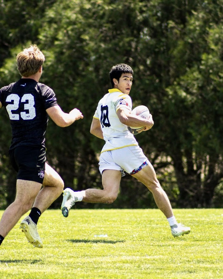 Ren Heimer looks back as he scores his final try as a Hawkeye