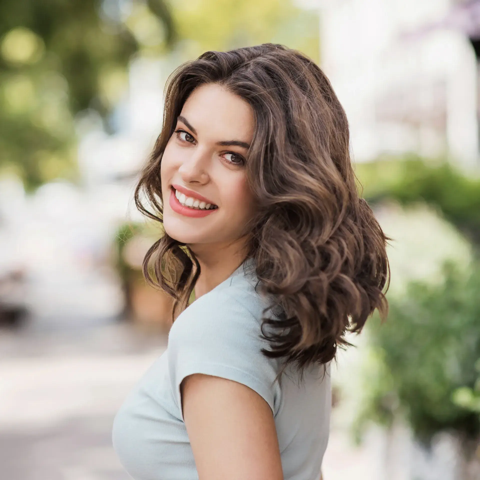 A woman with a smile on her face.