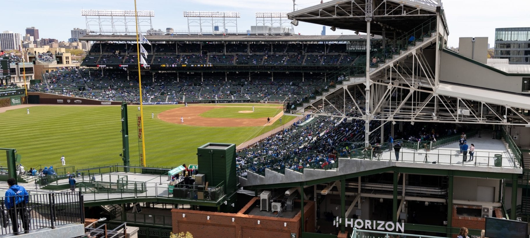 The view from Wrigley View Rooftop, overlooking the field and the crowd below