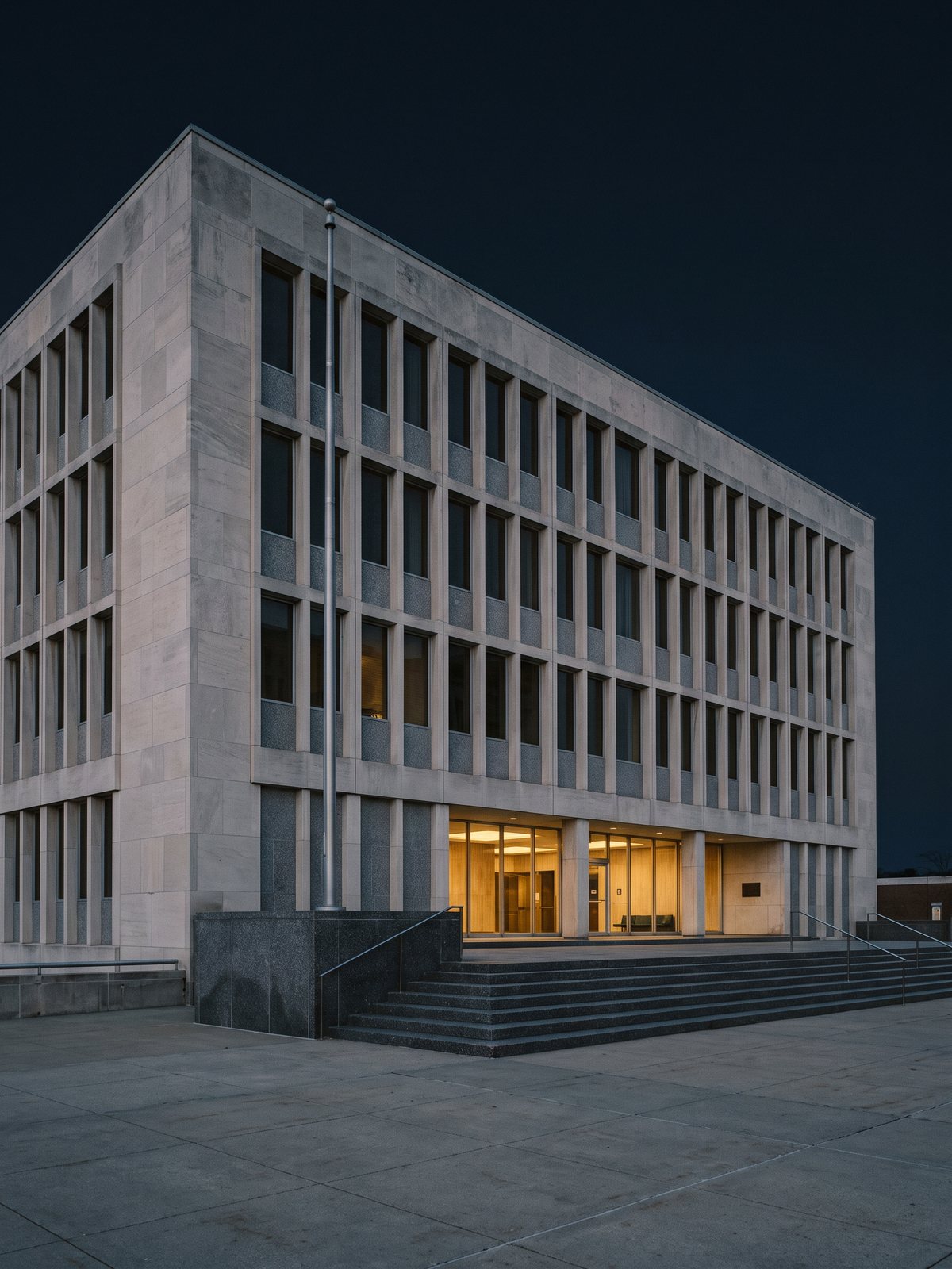 Exterior of a state government administration building at dusk