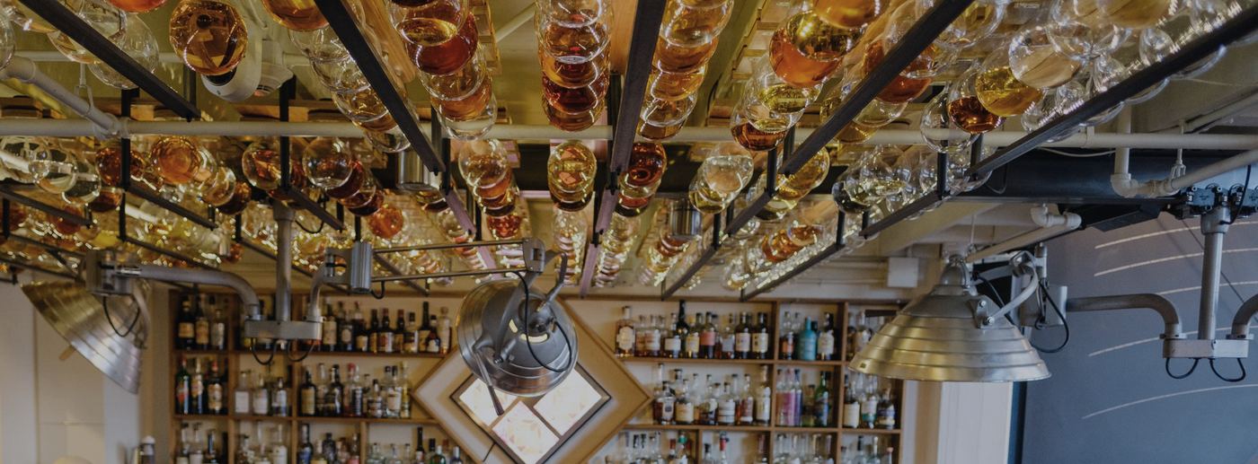 The bottle-lined ceiling over the bar at The Interval