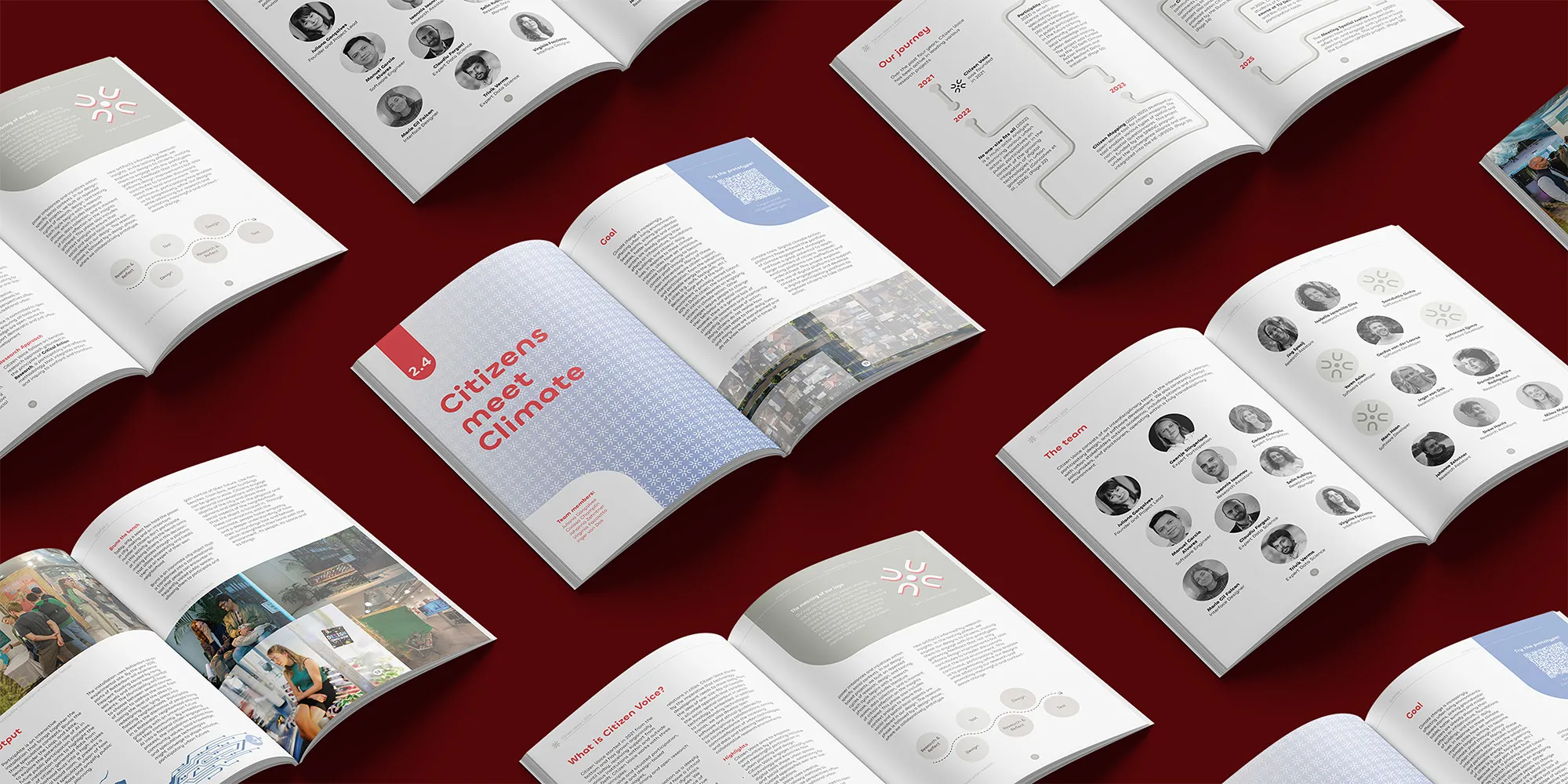 A flat-lay product shot of multiple open spreads of the Citizen Voice print portfolio, fanned out diagonally across a deep red background. Visible spreads include a chapter opener for "Citizens meet Climate," team pages with portrait photos, a project timeline, and a "What is Citizen Voice?" introduction page.
