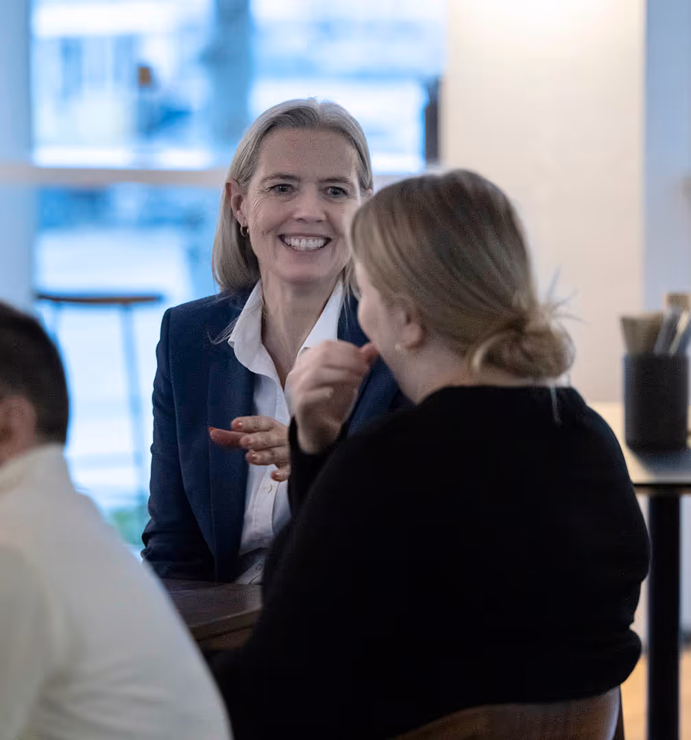 Two female cBrain employees in conversation