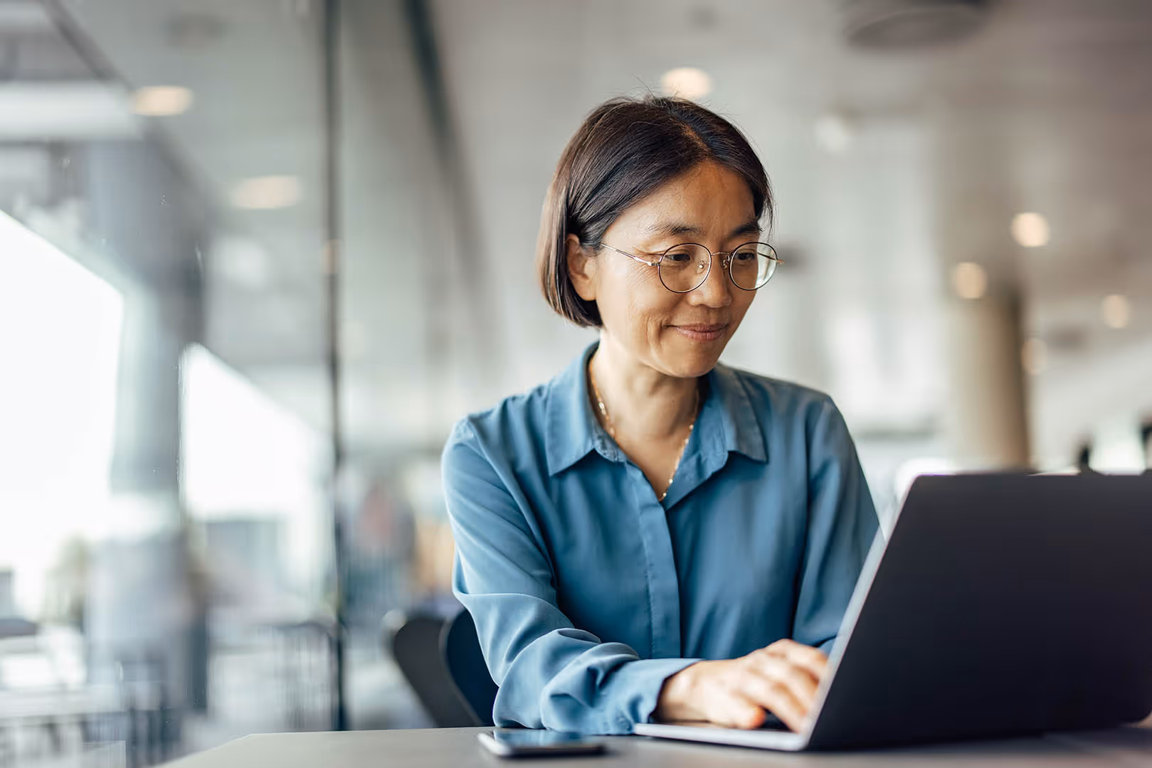 Female looking at laptop screen