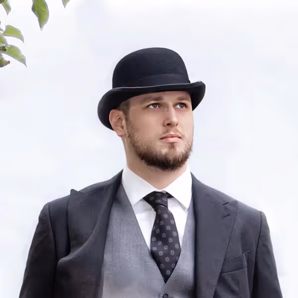 Professional headshot photo of Łukasz Niemier, Elixir and Erlang developer specializing in observability