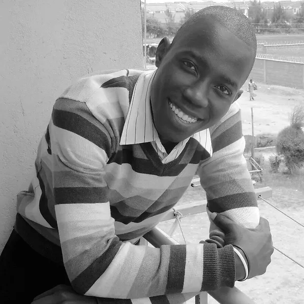 Professional headshot photo of Sigu Magwa, Community Lover, Software Writer, and Team Builder