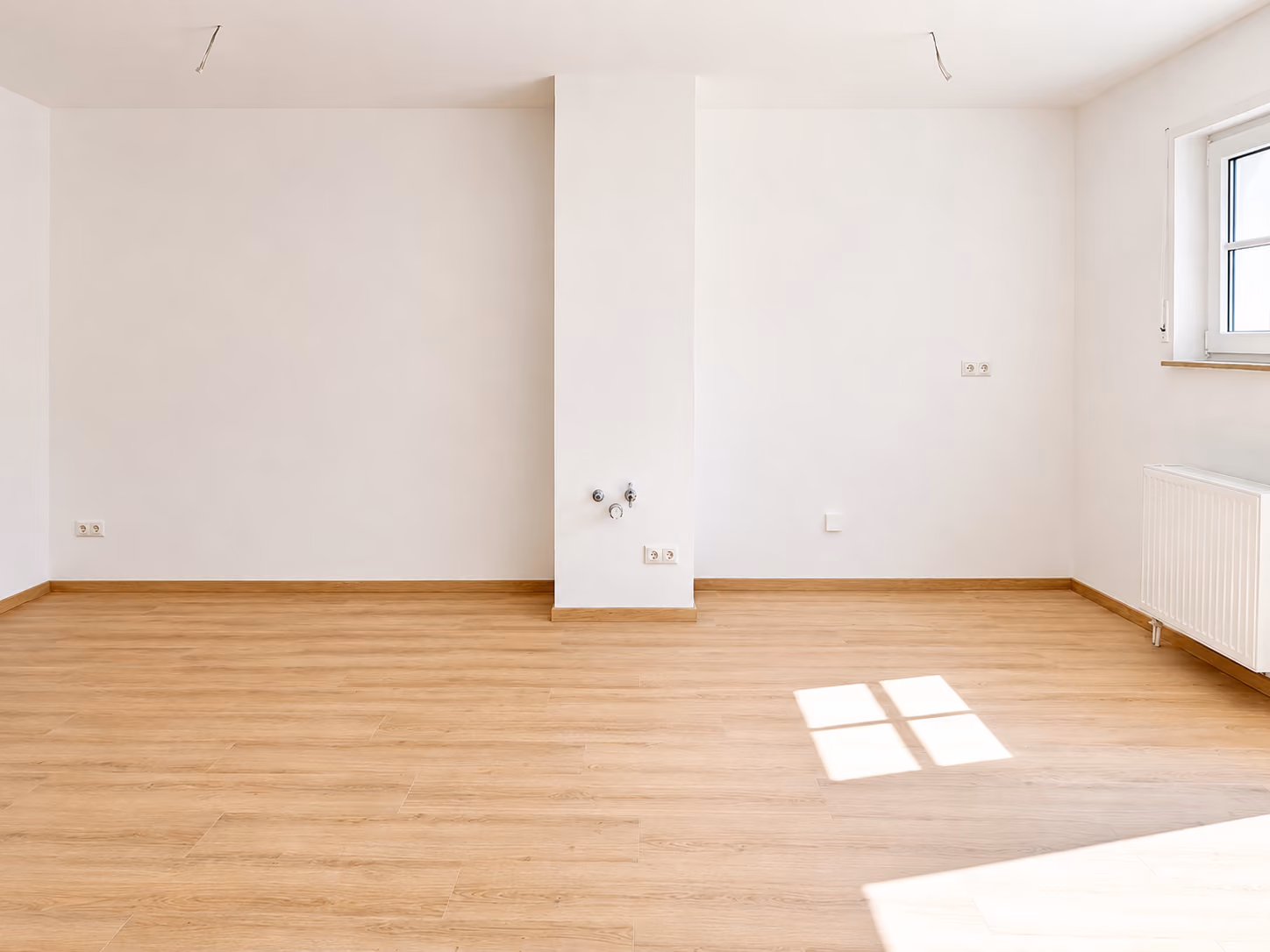 objektbilder Wohnzimmer mit offener Küche