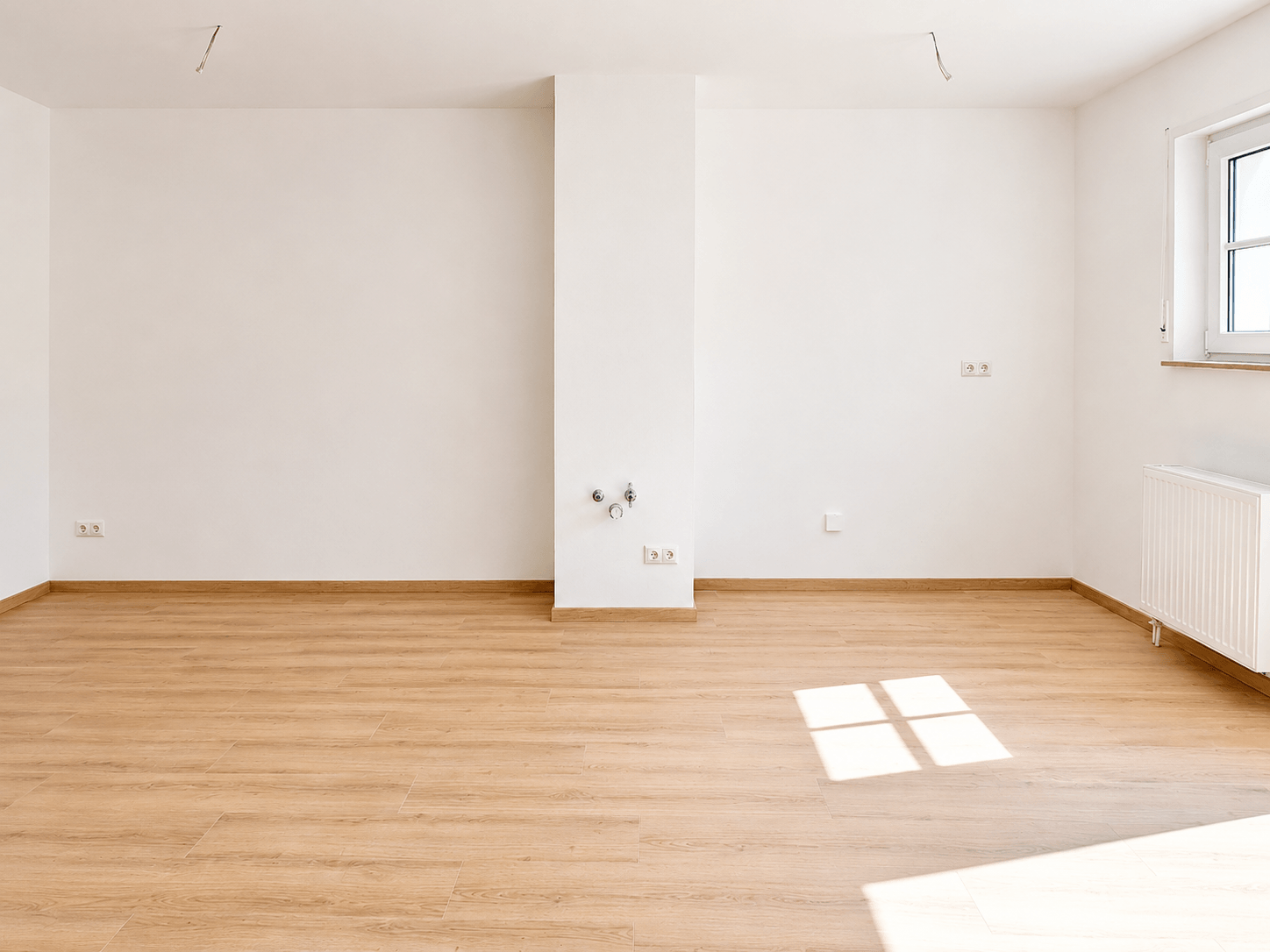 objektbilder Wohnzimmer mit offener Küche