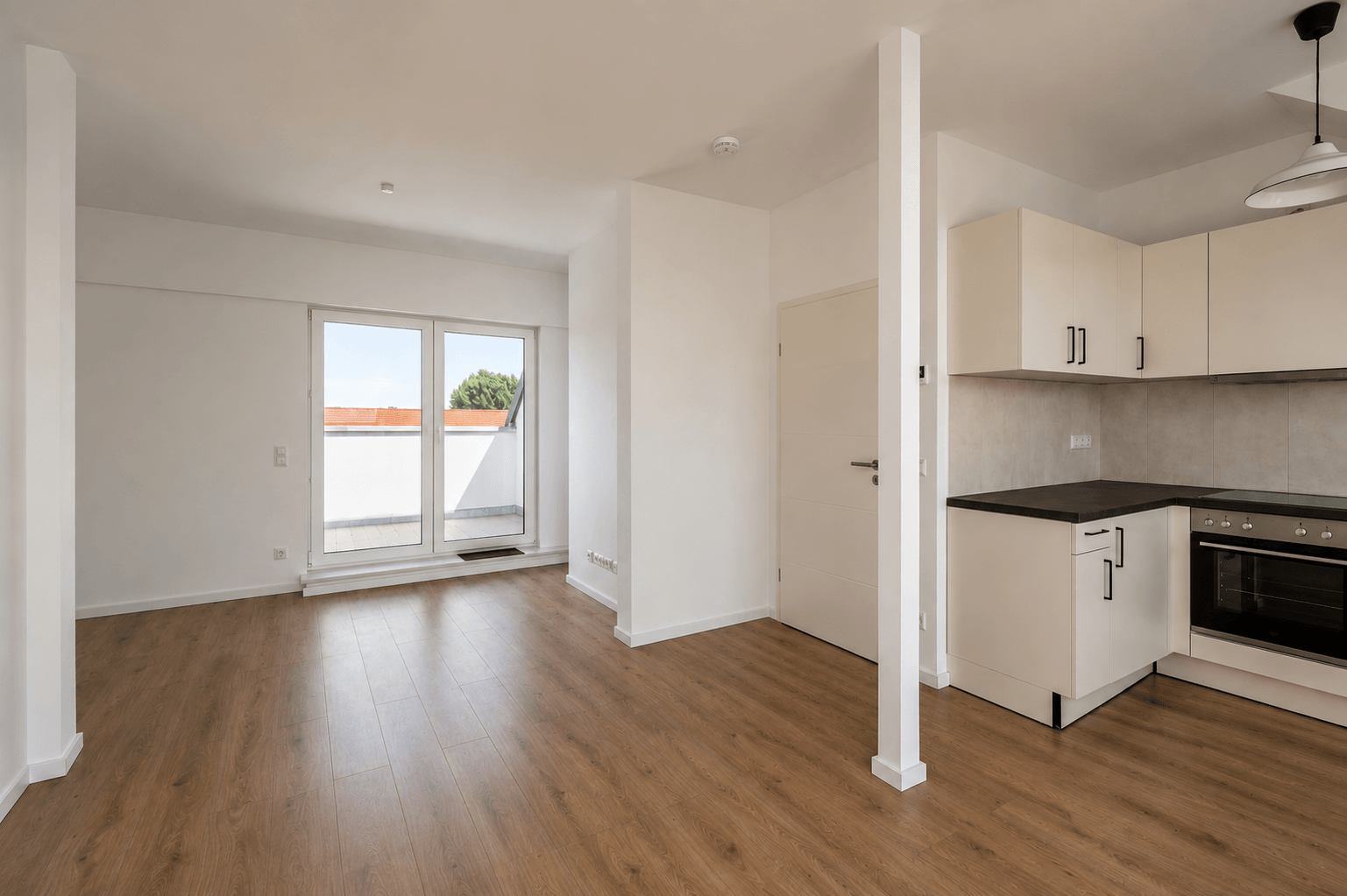 objektbilder Wohnzimmer mit offener Küche