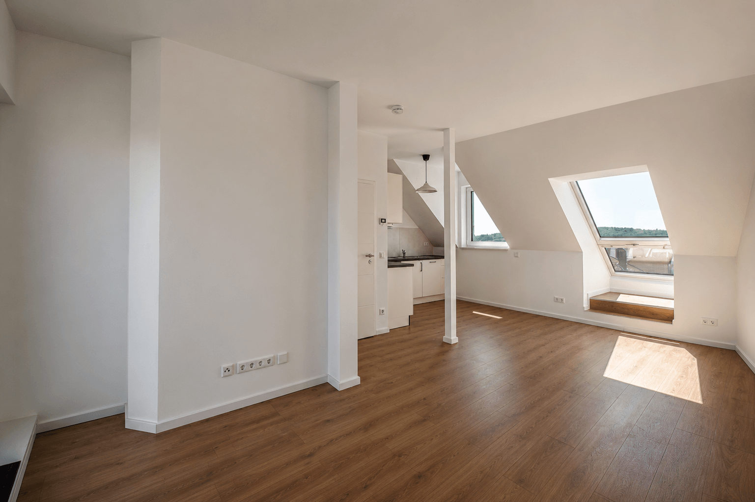 objektbilder Wohnzimmer mit offener Küche