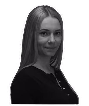 Black and white portrait of a woman with long straight hair, facing slightly sideways.