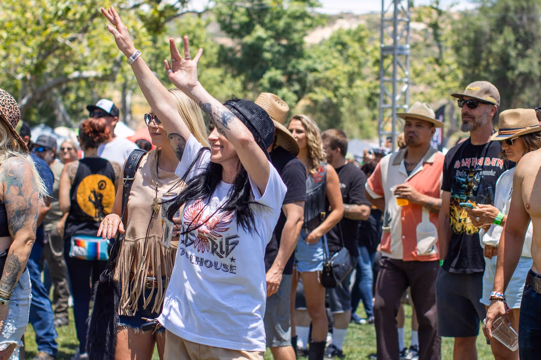 Woman cheering hands up