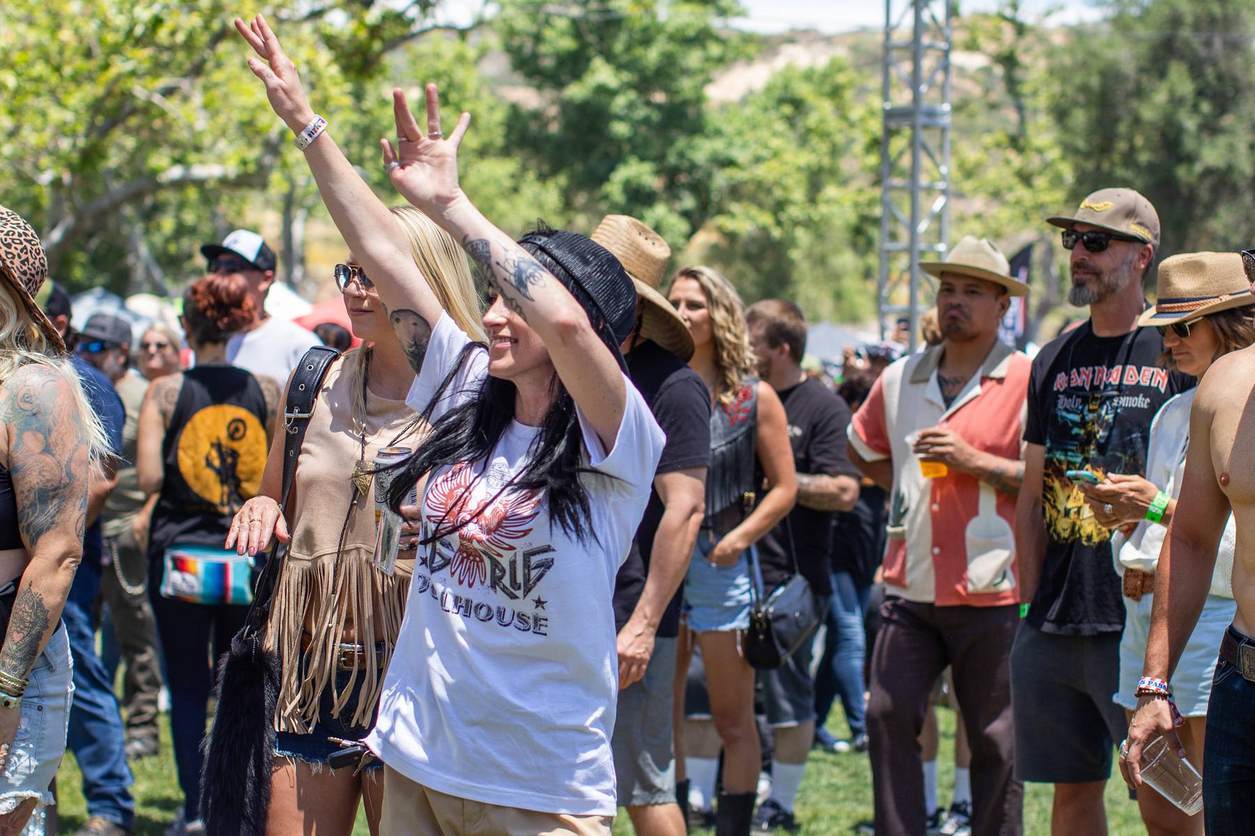 Woman cheering hands up