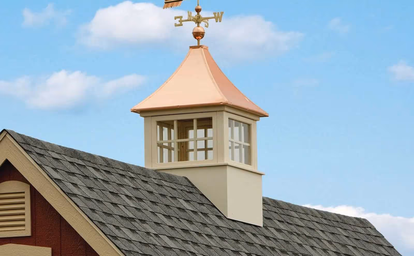 Select Carlisle cupola with square-pane windows and a copper roof topped with a rooster weathervane, perfect for barns and utility buildings in Millersburg, OH.