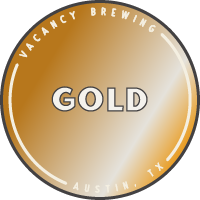 Burger with fried fries on black plate with sauce on the side