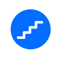 Blue circular icon with a white staircase-like upward arrow, symbolizing progress and step-by-step growth.