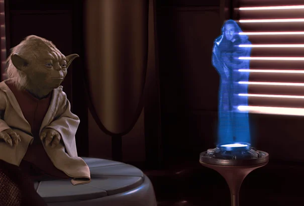 Hologramme de Yoda dans Star Wars illustrant la projection 3D imaginée par la science-fiction