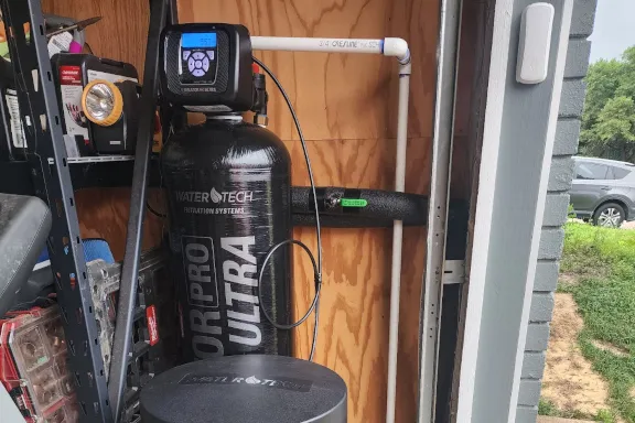 WaterTech water filtration system in a Dallas-Fort Worth home. Water conditioner and water softener benefits