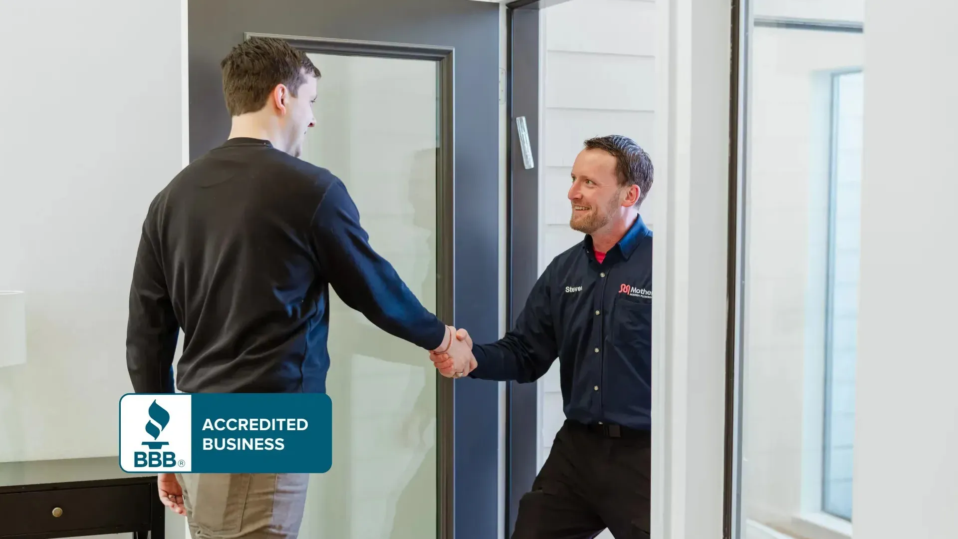 mother modern plumbing professional greets Fort Worth homeowner