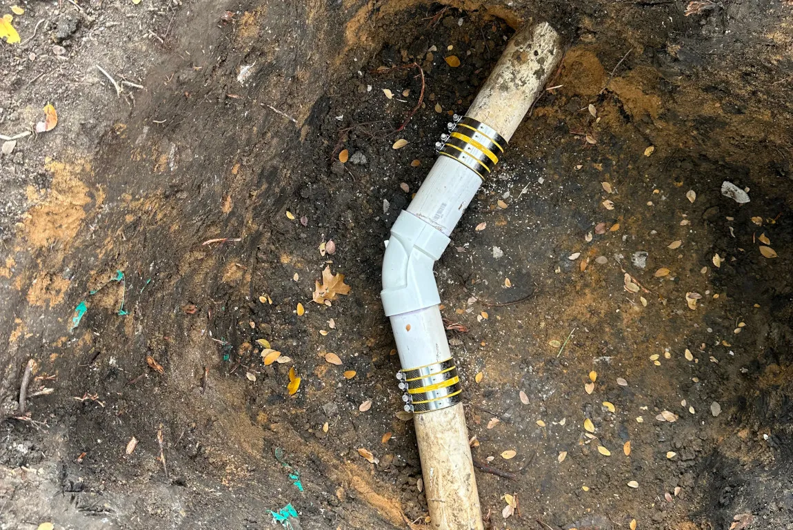 sewer line spot repair with schedule 40 pvc in dallas, tx backyard