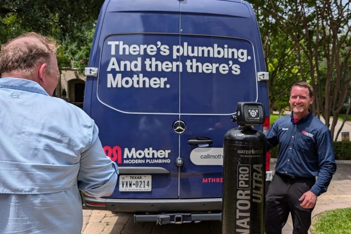 A plumber from Mother Modern Plumbing performing Whole Home Water Filtration in Flower Mound