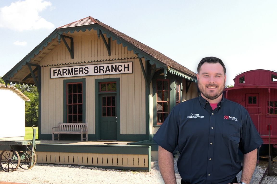 Photo of a uniformed plumber in Farmers Branch, TX from Mother Modern Plumbing standing and smiling