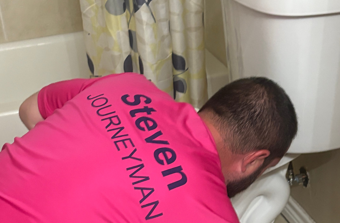 Mother Modern Plumbing inspects Dallas, TX toilet for leaks