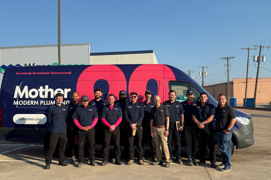 Mother Modern Plumbing staff stands in front of service van in Dallas, TX