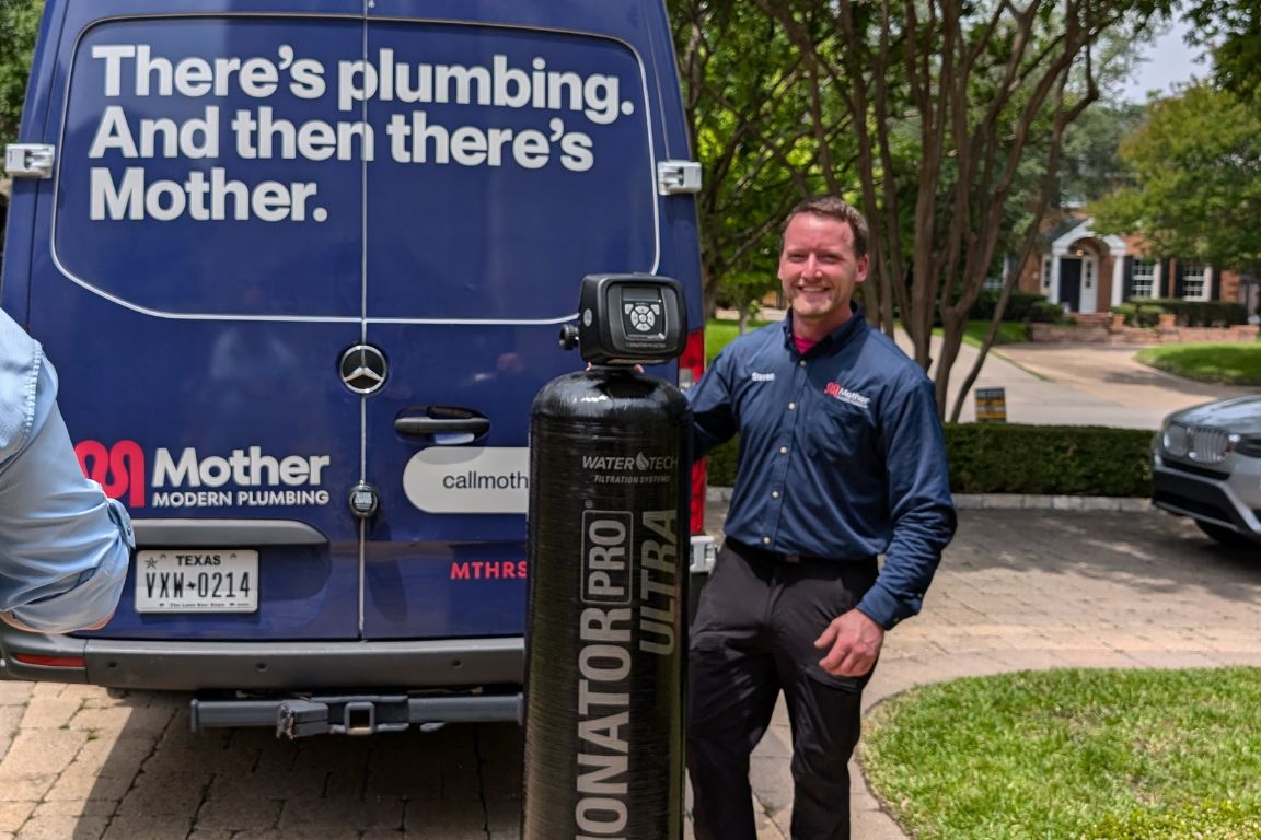 Mother Modern Plumbing Master Plumber and service van with whole home water filter system