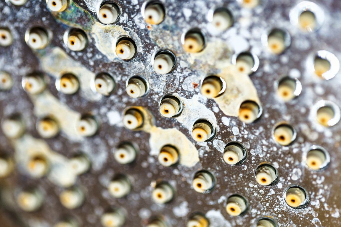 calcium deposits on shower faucet from hard water in dallas