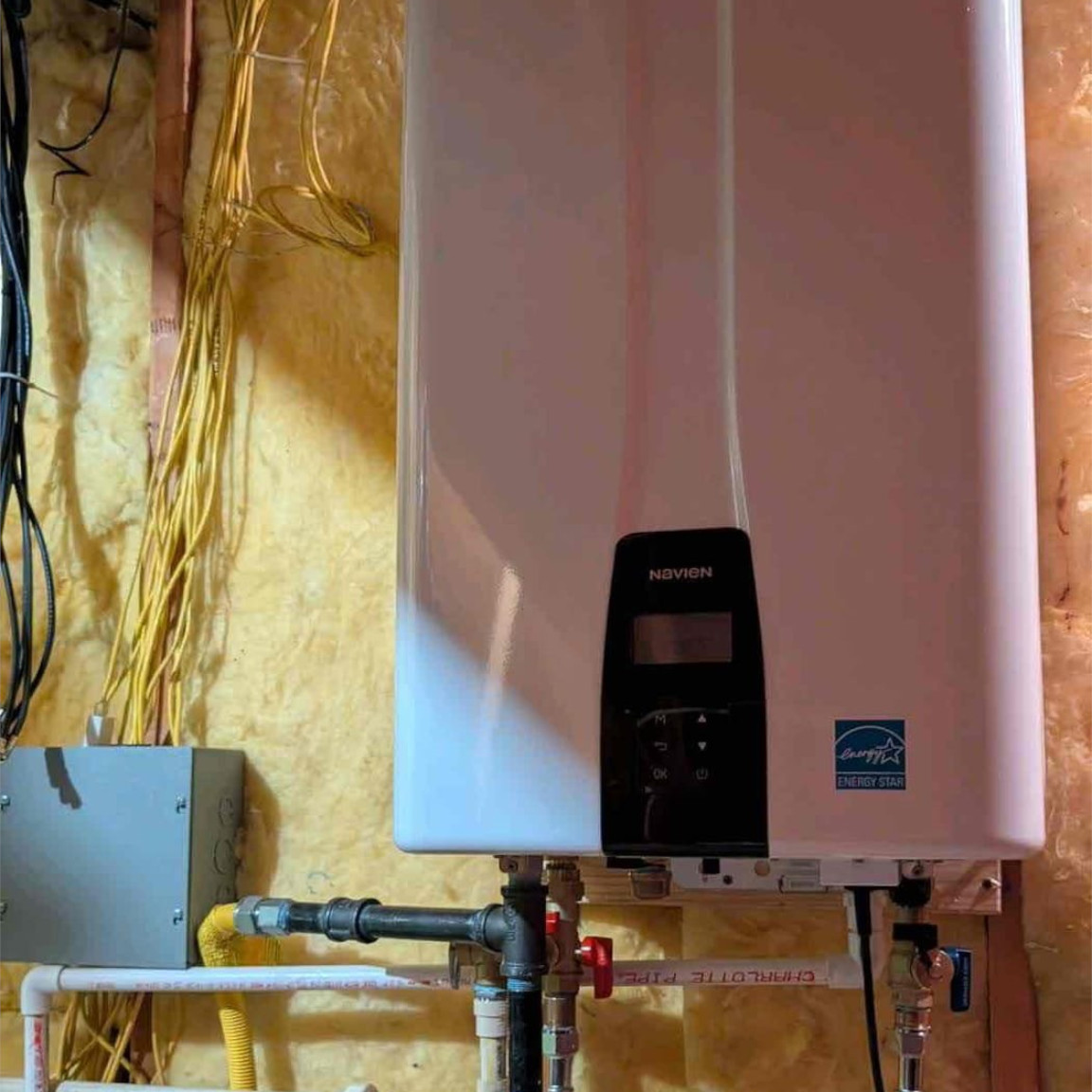 navien tankless water heater unit installed in dallas, tx home by mother modern plumbing