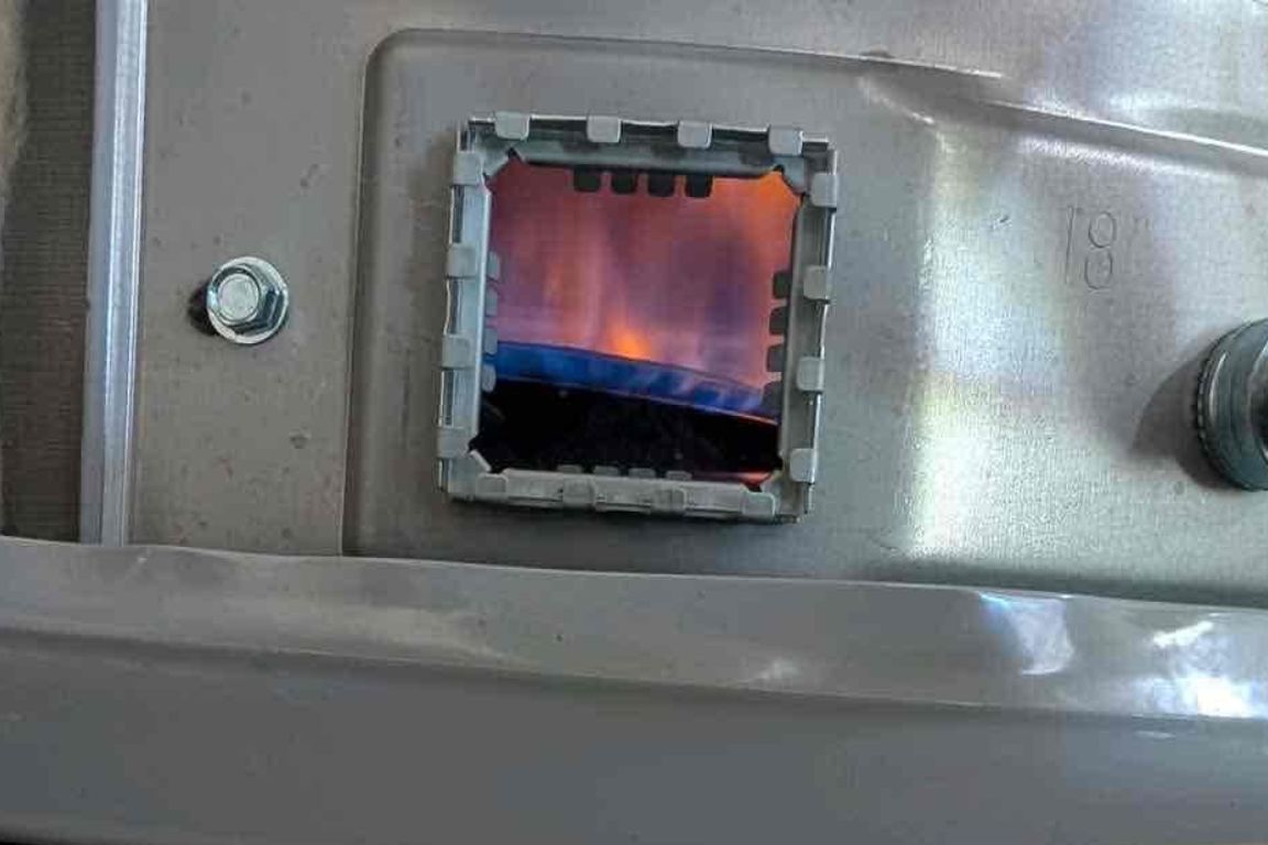 photo of water heater pilot light taken during routine maintenance in fort worth, tx home by mother modern plumbing