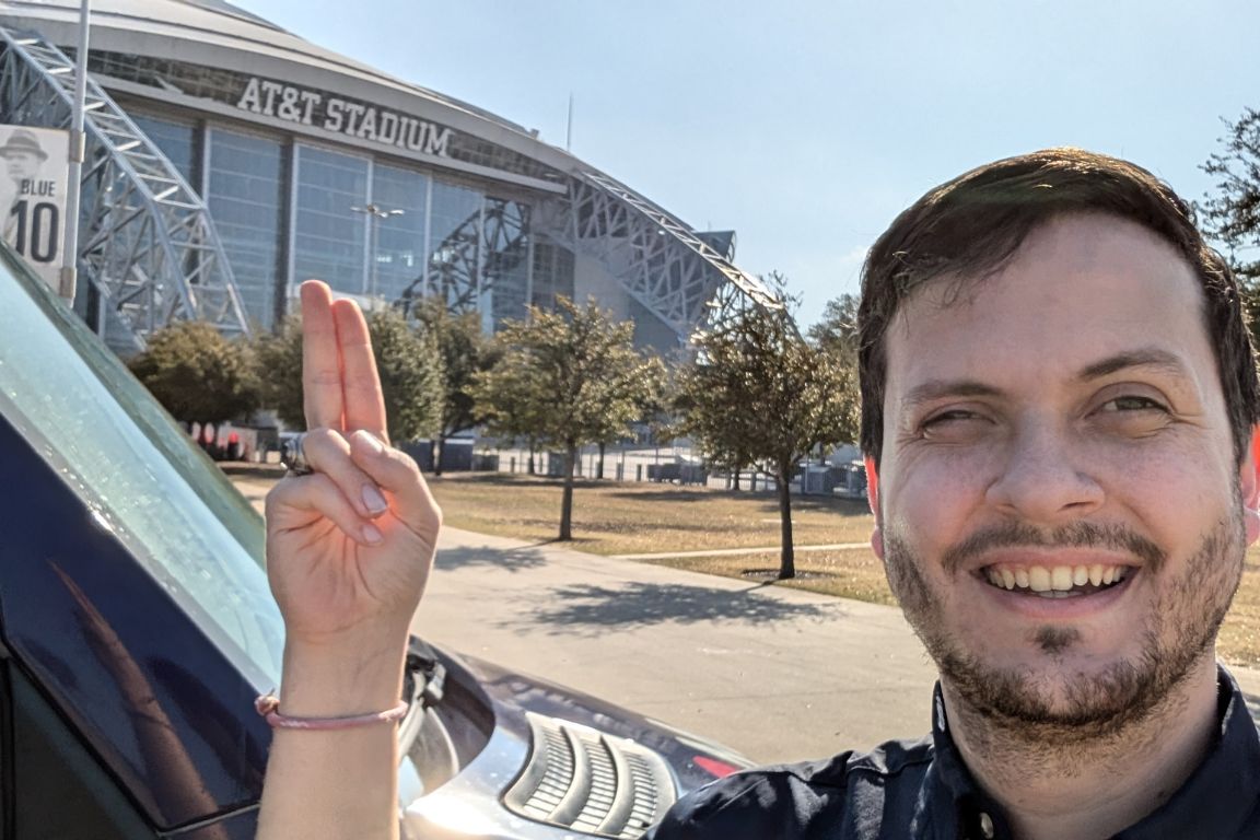 uniformed plumber from mother modern plumbing visits AT&T Stadium in Arlington, TX