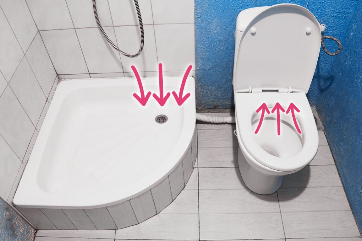 photo diagram of trapped air creating a bubbling toilet while the shower drains water