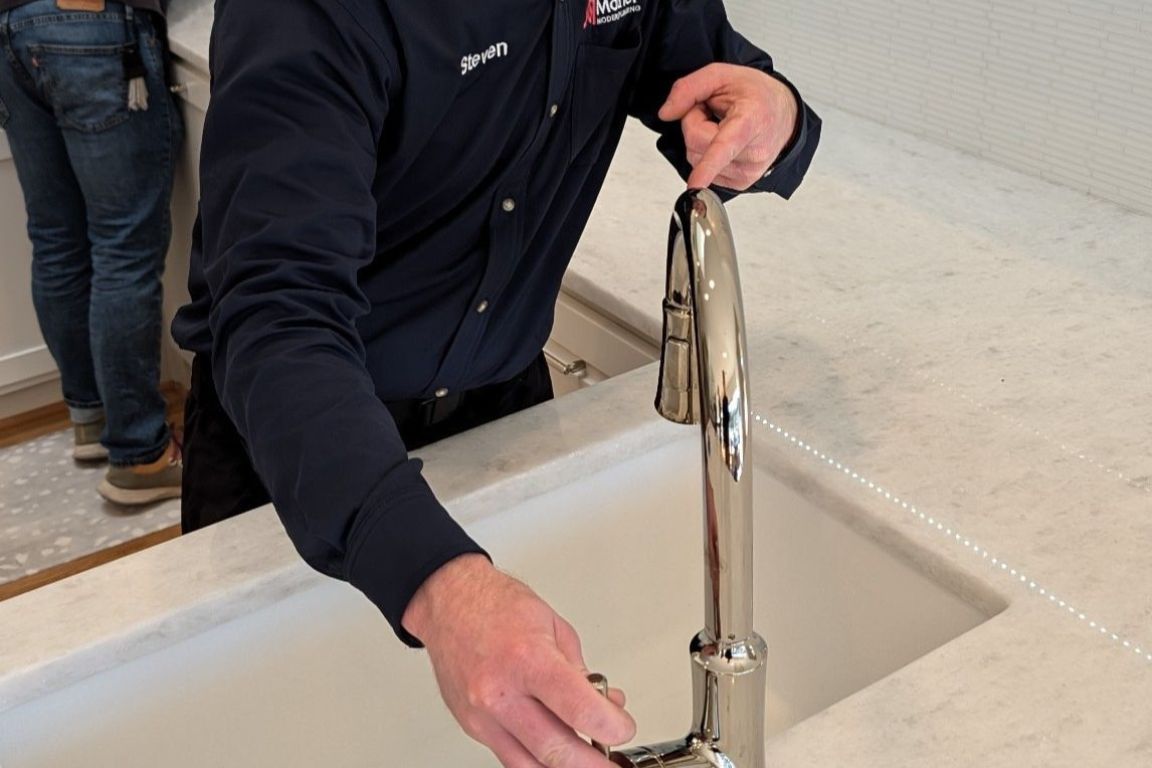 master plumber installs new kohler faucet in denton tx kitchen, mother modern plumbing