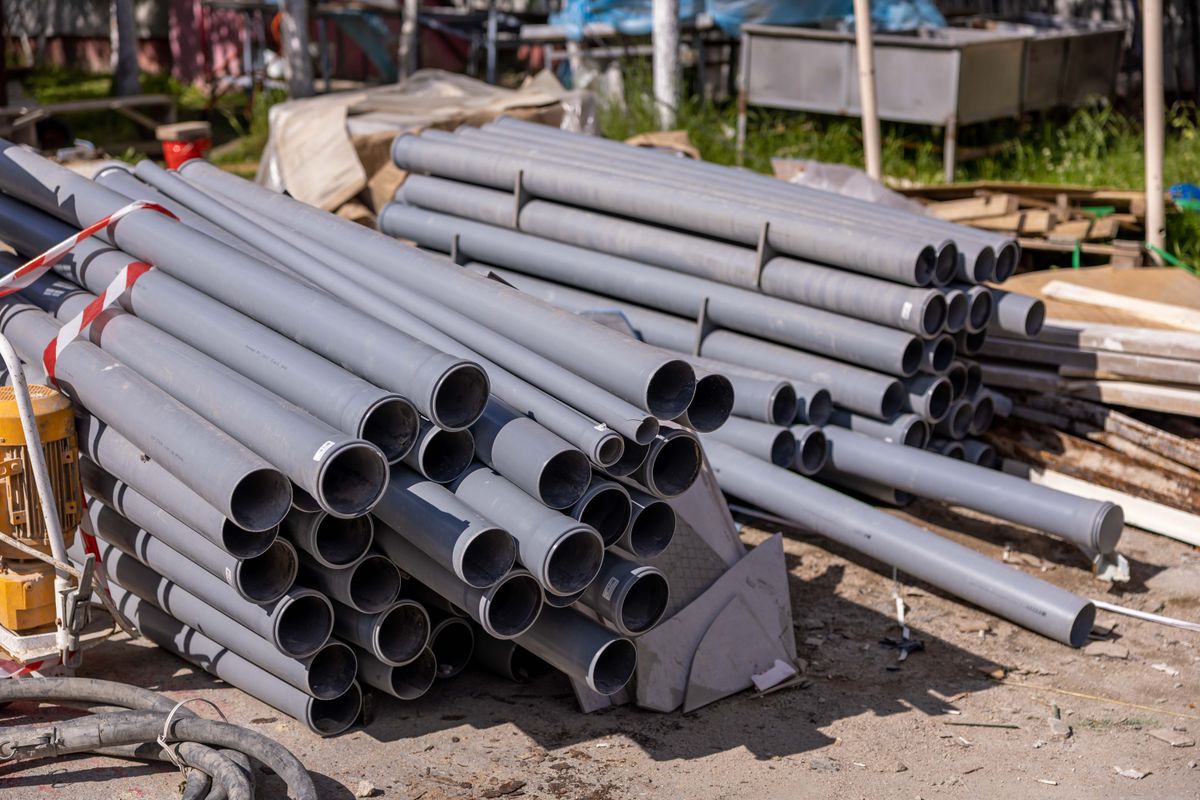 Stack of drainage pipe ready for installation