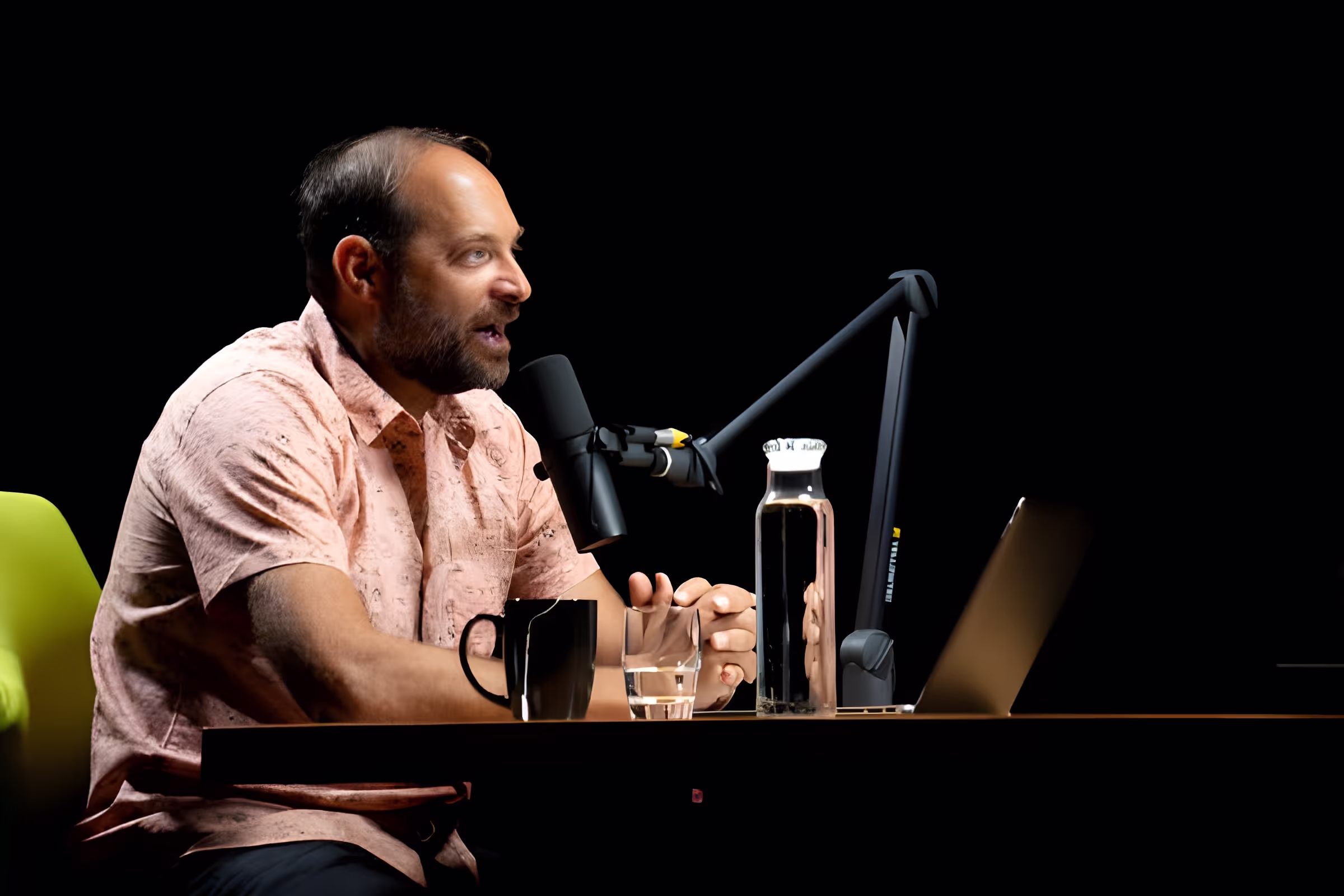 Adam Skolnick talking to Rich Roll in the podcast Studio