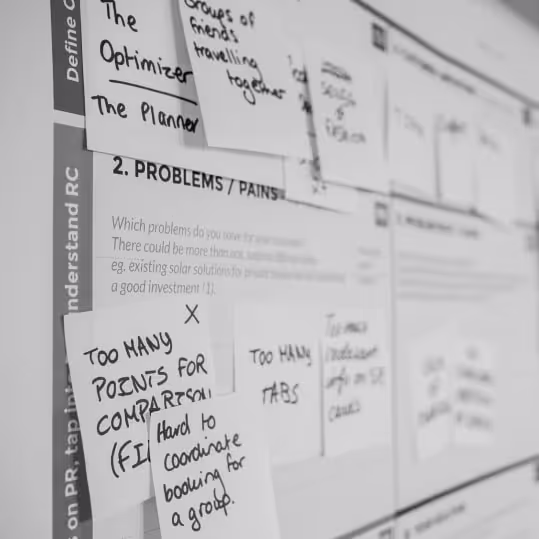 a bulletin board with several notes attached to it