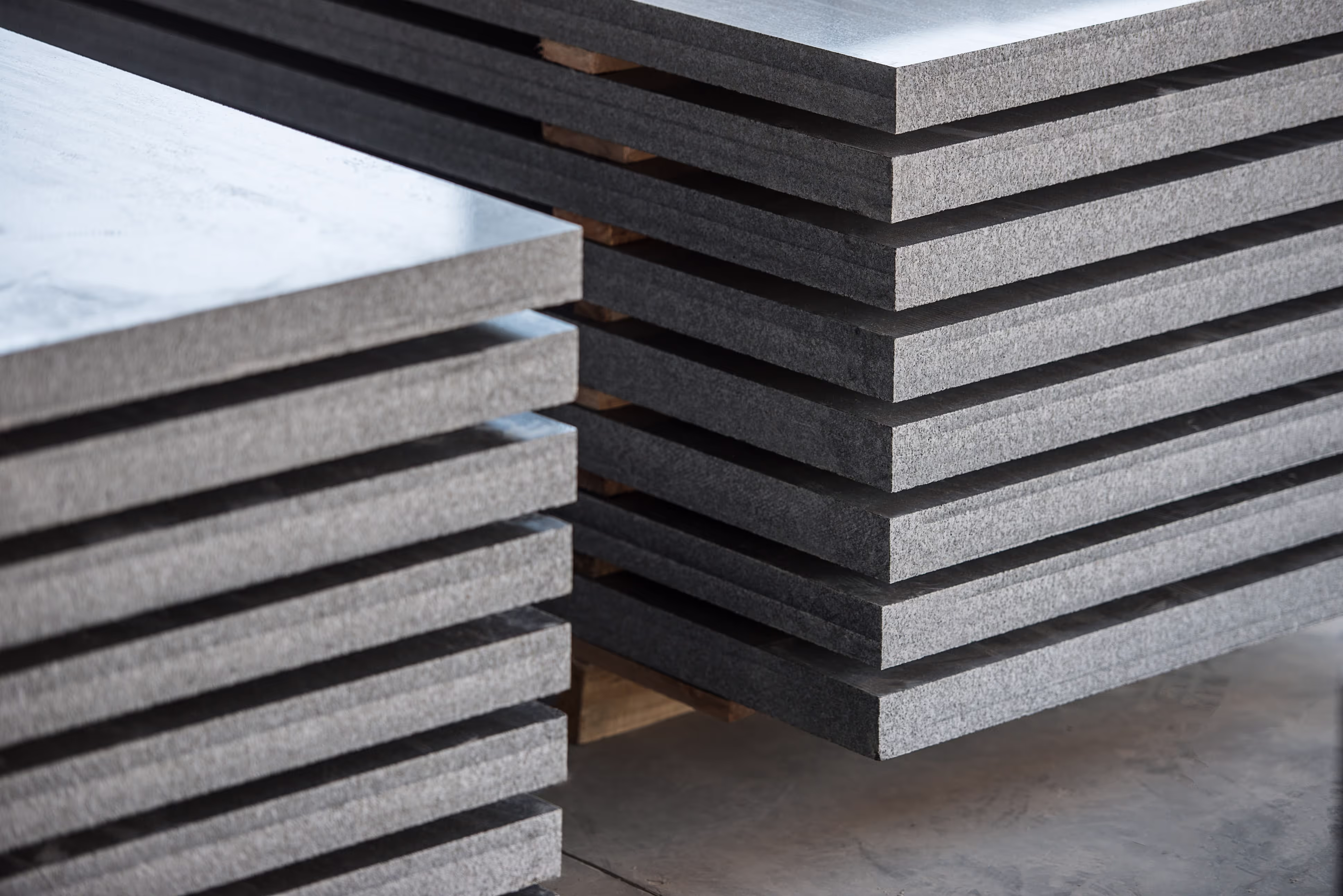 Neatly arranged granite slabs used for tombstones.