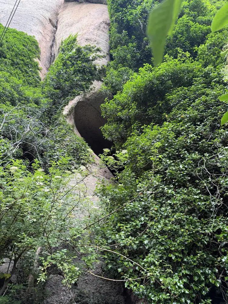 Hermit cave opening in the cliffs near Badovas, Meteora