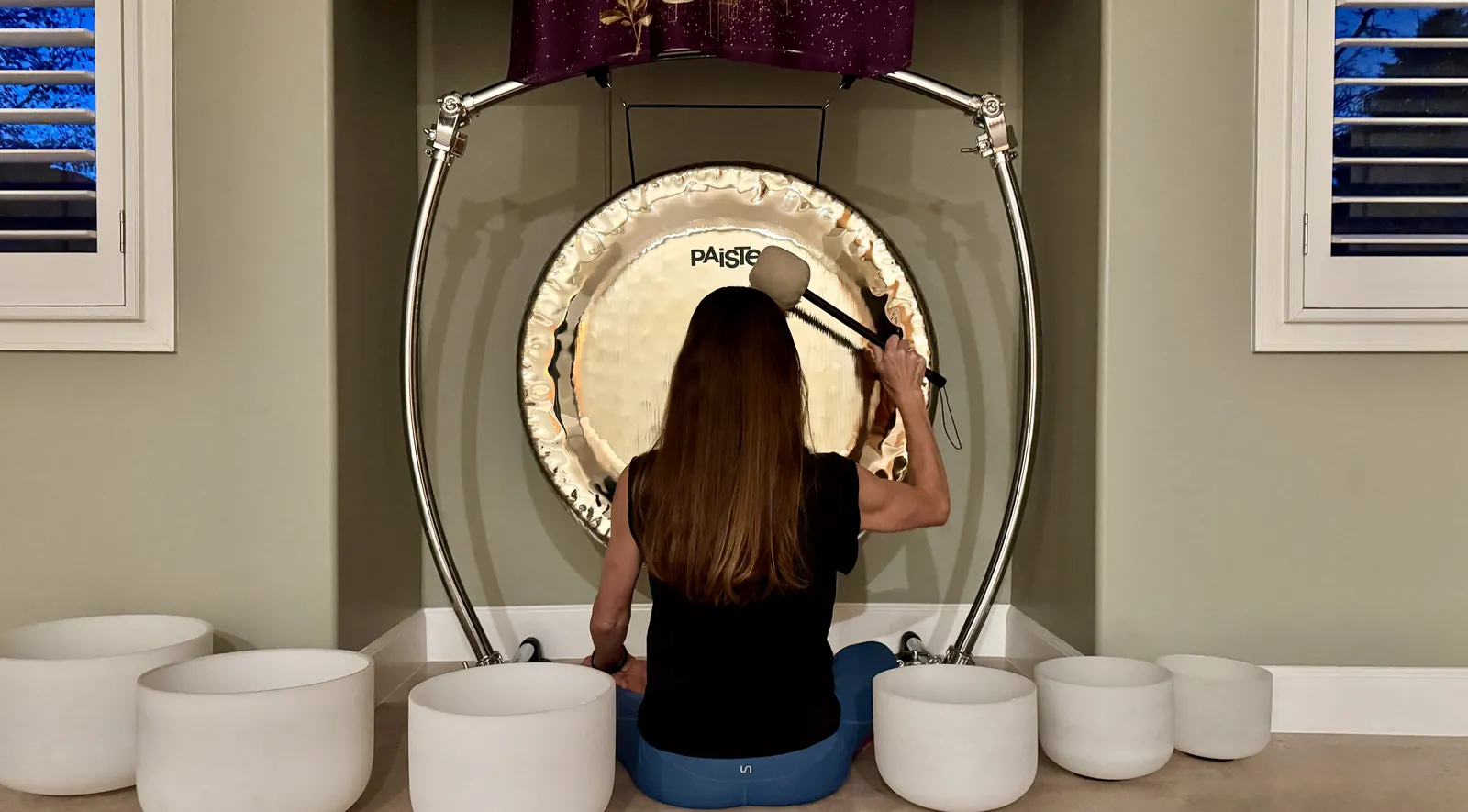 Rachel Cieslewicz at the gong in the YogaSoul shala