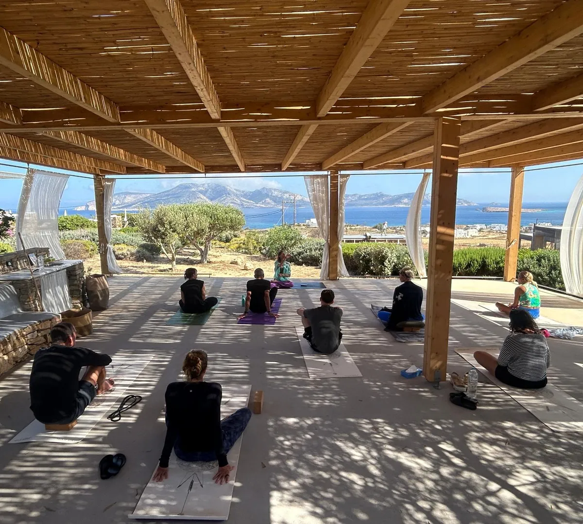 A meditation circle at sunset on Koufonisia