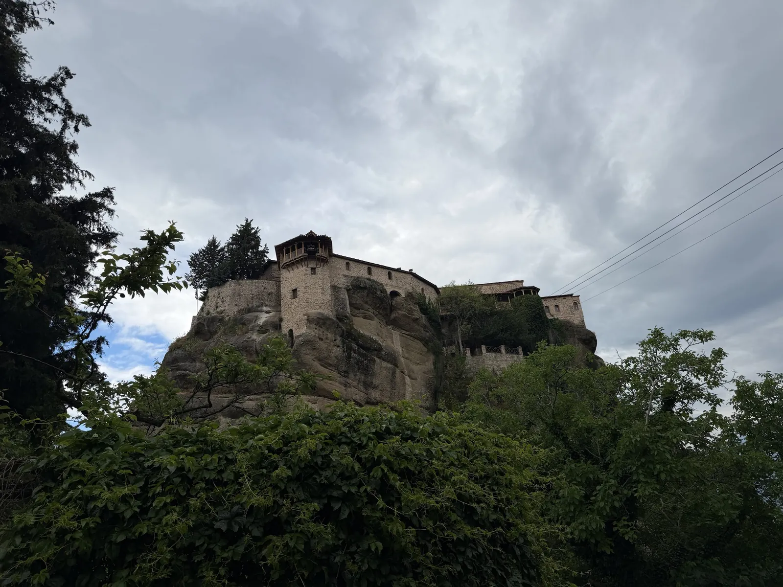 A monastery on its rock pillar above the plain, Meteora
