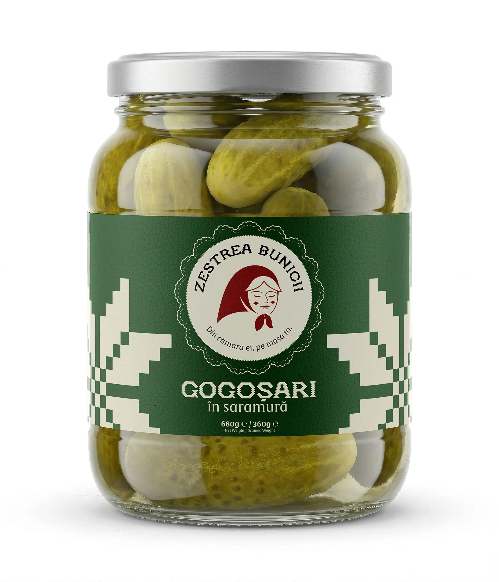 Render of a Zestrea Bunicii jar of Gogoșari în saramură: pickled peppers behind a deep-green wrap label with the cream grandmother badge and cross-stitch stars.