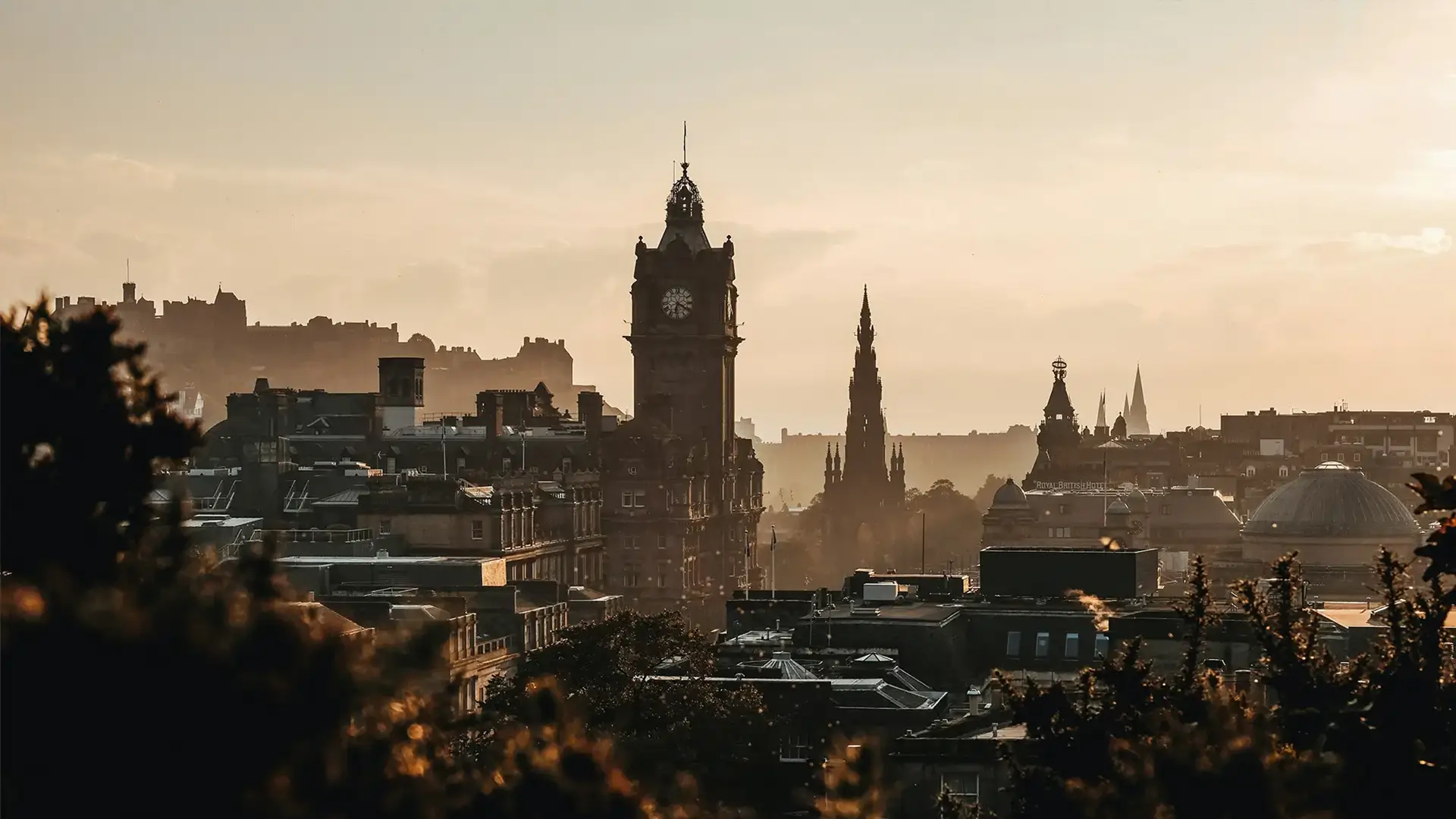 Edinburgh skyline at sunset viewed across the historic city centre